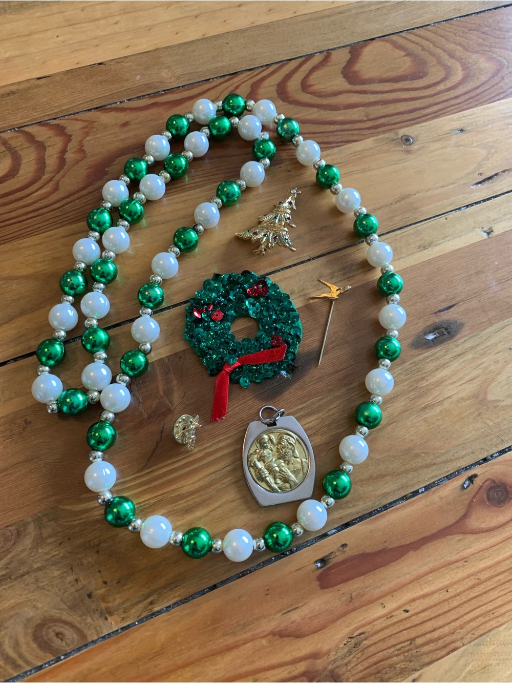 Source Unknown Green and White Beaded Necklace with Gold Religious Medal